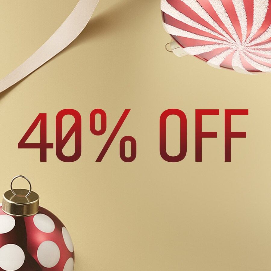 Close up of Long-Wear Cream Shadow Stick with swatch behind on top of a soft-grey background